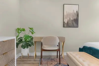 a living room with a desk and a chair at Near LLU Hospital Calm 3BR Workspace in Loma Linda
