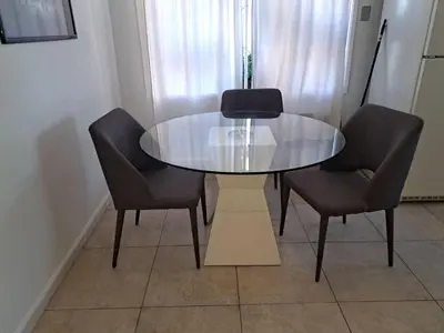 a glass table with two chairs and a glass table and chairs at Charming 1 bedroom apt in Beverly Hills in Los Angeles