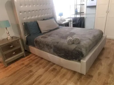 a bedroom with a bed with two rings on it at Charming 1 bedroom apt in Beverly Hills in Los Angeles