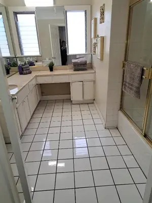 a bathroom with a shower and a sink and a mirror at 3 bedroom plus 2 baths in Beverly hills in Los Angeles