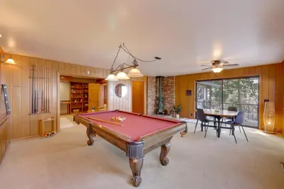 a room with a pool table and a dining room at Mtn and Valley Views! Rimforest Lodge with Fireplace in Rimforest