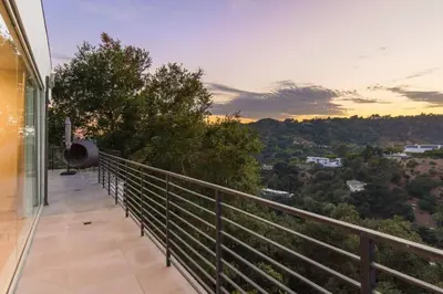 a balcony of a house with a view at Spacious 4BR Retreat with Private Pool, Pool Table and Fast Wi-Fi Sleeps 9 Quiet Clinton Location in Beverly Hills