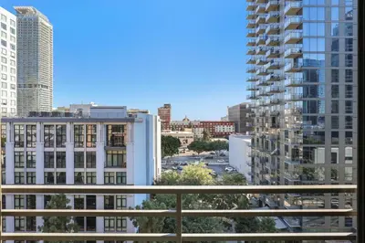 a view of a city from a balcony at Luxe DTLA Escape - Walk to Games, Events, & Dining in Los Angeles
