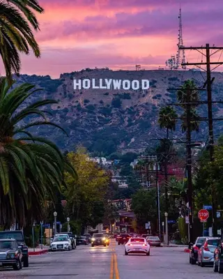 a hollywood sign on the side of a mountain at Hillside Retreat Near Universal Studios & Hollywood Sign in Los Angeles