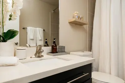 a bathroom with a sink and a toilet at Upscale 1BD - Prime West Hollywood Location in Los Angeles