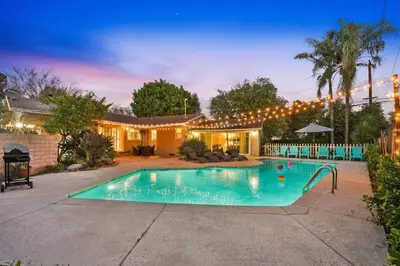 a swimming pool in front of a house at 4BR Home near Universal - Private Pool, BBQ, Free Parking in Hickson