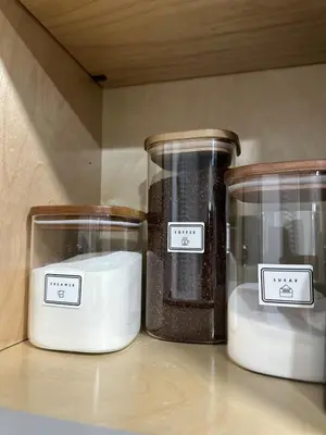 three containers ofented candles sitting on a shelf at Walkable to SoFi, Intuit Dome, Kia Forum World Cup in Inglewood