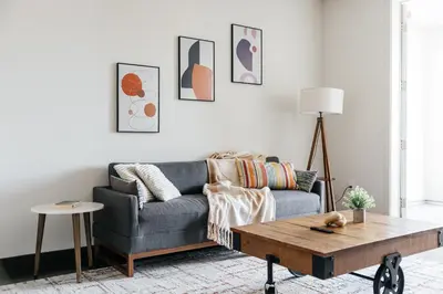 a living room with a couch and a coffee table at Cute 1Bedroom apartment with pool view, parking and GYM in Los Angeles