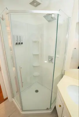 a shower with a glass door in a bathroom at silver in Chatsworth