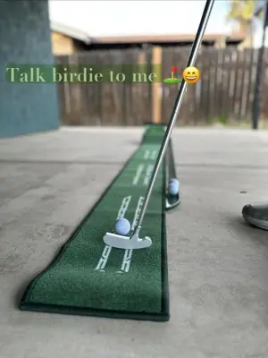 a miniature golf course with a golf ball on it at Brick & Breeze in Bakersfield