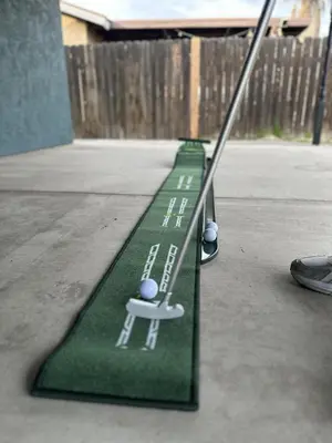 a green object with a baseball game on it at Brick & Breeze in Bakersfield