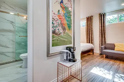 a hotel room with a bathroom with a shower at 4 Mi to Old Pasadena! Well-Appointed Studio Stay in Pasadena