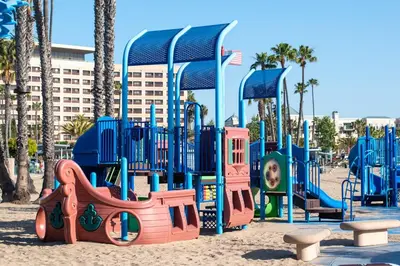 a playground in the sand in a park at The Glass Anchor - 2 Bed Front-Row Marina Suite in Los Angeles