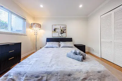 a large bedroom with a large bed in a room at Bright 2 Bedroom Home in the Heart of Santa Monica in Los Angeles