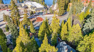 an overhead view of a park with trees and a building at Holiday Lake Cabin by AvantStay Large Deck Cozy Fireplace Near Arrowhead Village in Lake Arrowhead