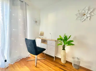 a room with a chair and a desk and a plant at Spacious 3BR House Culver City Santa Monica & West LA in Los Angeles