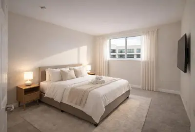 a bedroom with a bed with a window and a television at Marina 1-Bedroom & 2-Bedroom - Near Venice Beach & Marina in Los Angeles