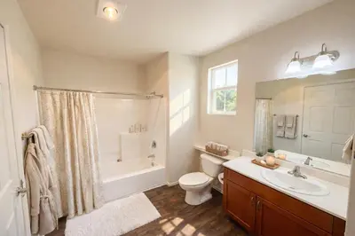 a bathroom with a sink and a toilet and a shower at Serenity Close To Marina Docks - Short Trip To Venice Beach in Los Angeles