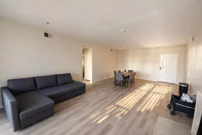 a living room with a couch and a table at Marina Modern 2BR 2BA in Los Angeles