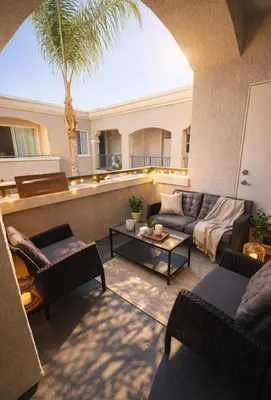 a living room with couches and a palm tree at Marina Modern 2BR 2BA in Los Angeles