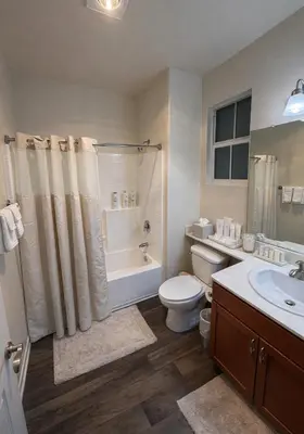a bathroom with a toilet and a tub and a sink at Marina del Rey 2BR-2BA Oasis - Quick Trip to Venice in Los Angeles