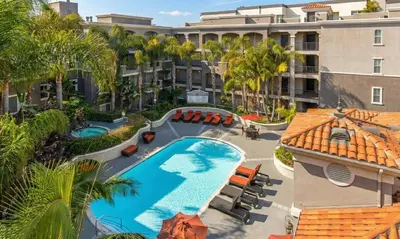 an overhead view of a pool at a resort at Marina del Rey Comfort - Venice Beach Vibes - 2BR & 2BA in Los Angeles