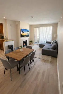 a living room with a table and chairs and a couch at Marina del Rey 2BR-2BA Coastal Retreat Near Venice Beach in Los Angeles