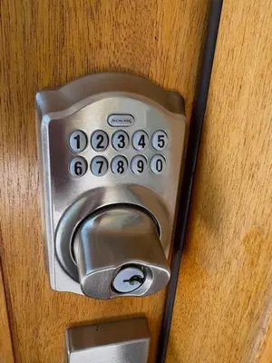 a metal door handle on a wooden door at Modern 3Bedroom 3Bath Townhouse in Sherman Oaks