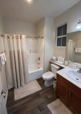 a bathroom with a toilet and a tub and a sink at Marina del Rey Cozy 1BR - Near Venice Beach in Los Angeles