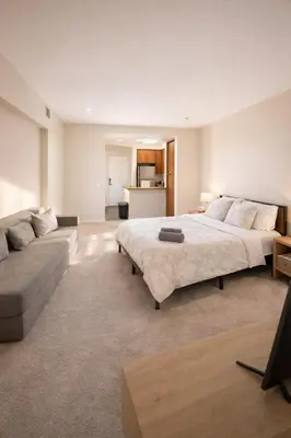 a large bedroom with two beds and a couch at Marina del Rey 1BR Escape & Venice Beach in Los Angeles
