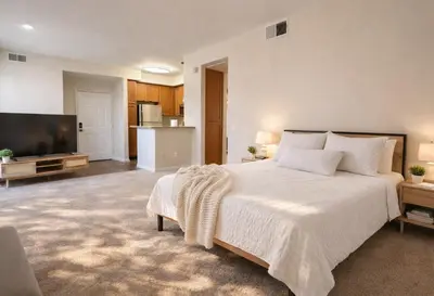 a bedroom with a large bed and a flat screen tv at Marina del Rey 1BR Escape Near Docks, Close To Venice Beach in Los Angeles