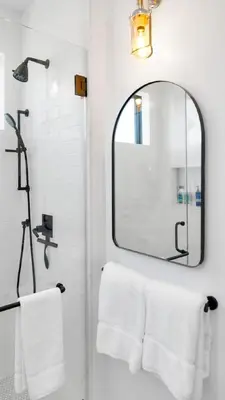 a bathroom with a mirror and white towels at NEW Venice Rose Ave Retreat with Sunset Deck in Los Angeles