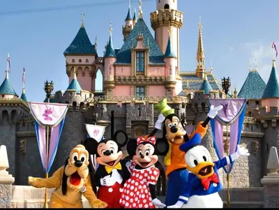 a group of mario and mickeys in front of a castle at Spacious 2 bed 2 bath, Pool, Hottub, Wifi, 24 hr Fitness, Parking in Los Angeles