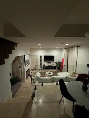 a living room with a couch and a table at Venice beach in Los Angeles