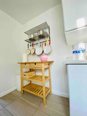 a kitchen with a table with pots and pans at Beach House in Los Angeles