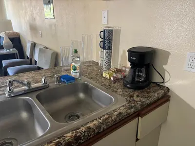 a kitchen counter with a sink and a coffee maker at 1Bd Prime Westwood Location One Block from UCLA in Los Angeles