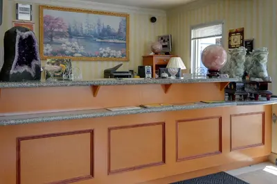 a room with a counter with lots of vases at Vagabond Inn Hacienda Heights in Hacienda Heights