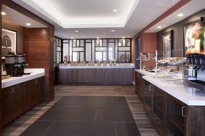 a restaurant lobby with aasteryasteryasteryasteryasteryasteryasteryasteryasteryasteryastery at Fairfield Inn & Suites By Marriott Camarillo in Camarillo