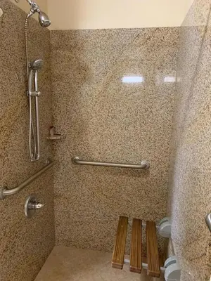 a bathroom with a shower and a toilet at Fullerton Lodge in Fullerton