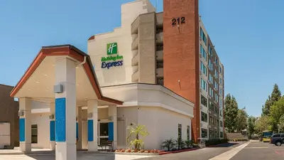 a hotel building with a kings cross sign on it at Holiday Inn Express Fullerton-Anaheim by IHG in Fullerton