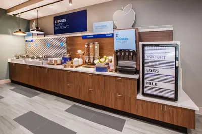 an apple store with a counter with an appleasteryasteryasteryasteryasteryasteryastery at Holiday Inn Express Fullerton-Anaheim by IHG in Fullerton