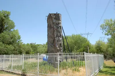 a climbing ape in a playground behind a fence at Soledad Canyon Wheelchair Accessible Cottage 16 in Ravenna