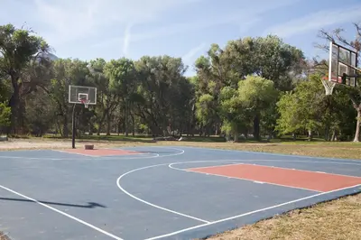 a basketball court with a hoop in a park at Soledad Canyon Cabin 18 in Ravenna