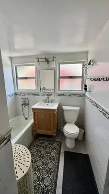 a bathroom with a toilet and a sink at Dresden B & B in Los Angeles