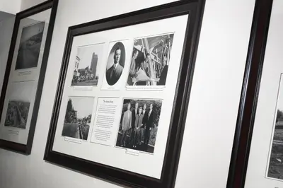 a framed picture offamous photographs hangs on a wall at Ayres Suites Ontario at the Mills Mall - Rancho Cucamonga in Ontario