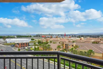 a view of a city from a balcony at Embassy Suites by Hilton Anaheim-Orange in Anaheim