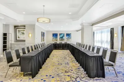 a conference room with a long table and chairs at Embassy Suites by Hilton Anaheim-Orange in Anaheim