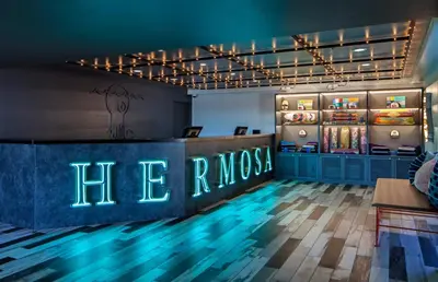 a restaurant with a sign that reads the ringer at Hotel Hermosa in Hermosa Beach