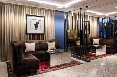 a living room with a couch and a table at Beverly Hills Marriott in Los Angeles