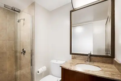 a bathroom with a toilet and a sink and a shower at Holiday Inn Express Simi Valley by IHG in Simi Valley